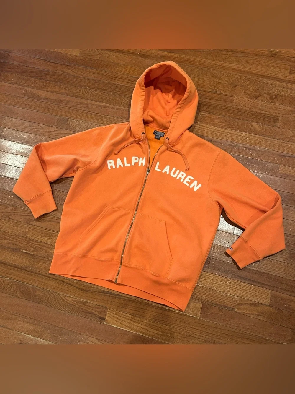 Polo Ralph Lauren full-zip hoodie with white text branding across the chest.